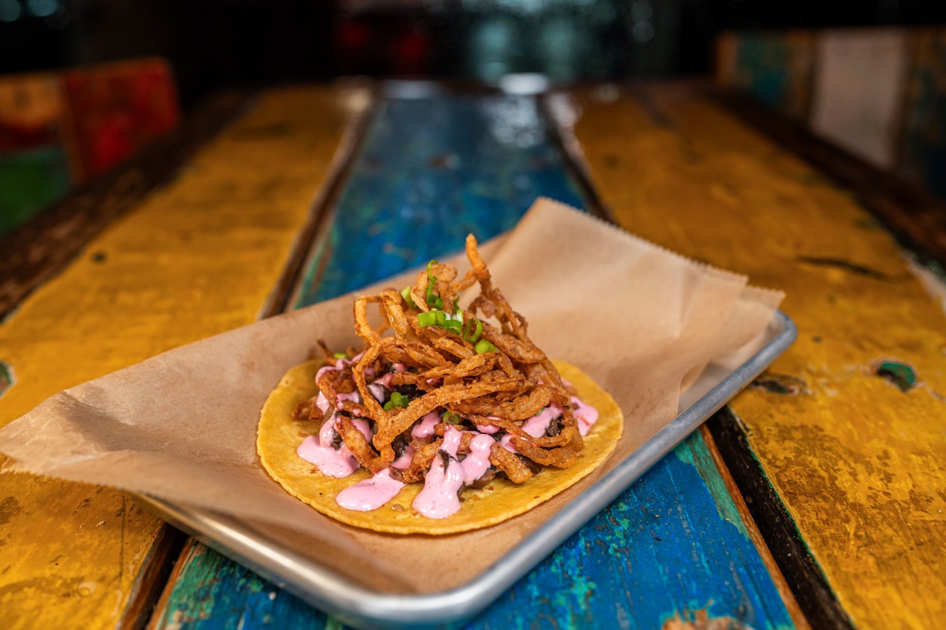 A veggie option that absolutely earns its place in the lineup.
The Ami Shroomer layers roasted mushrooms, crispy onions, truffle horseradish crema, and scallions for a taco that is rich, savory, and anything but an afterthought.
Add one to your next order and let the mushrooms do the convincing.
#AVOTACO #VeggieTacos #TacoLovers #MeatlessEats