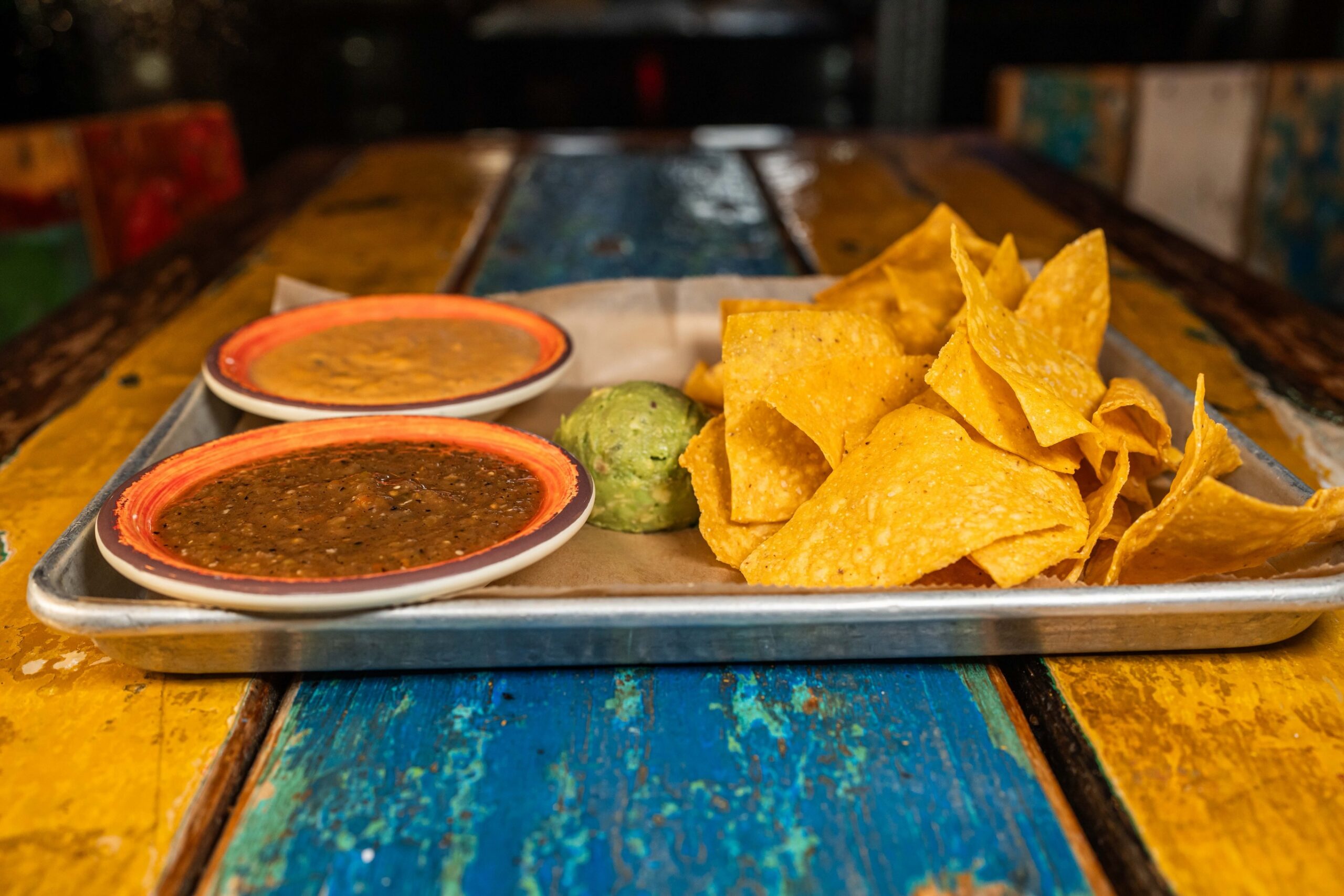 Three dips. One tray. Zero chance of leftovers.
The Three Amigos brings together fire-roasted salsa, creamy queso, and fresh guacamole, served with plenty of crispy tortilla chips for dipping, sharing, and pretending you are only having one more.
The hardest part is choosing where to dip first.
#AVOTACO #TheThreeAmigos #LongIslandEats #TacoNight #NachoLovers