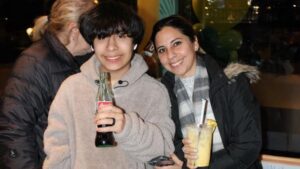 Two Happy Guests at AVO's Grand Opening in Bayside, Queens